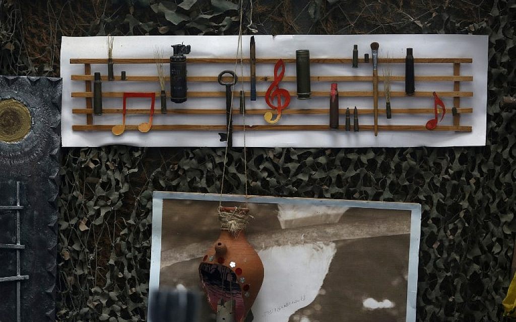 An art piece made from used ammunition rounds is displayed by Palestinian artist Mohammed al-Zamar on September 24, 2014, in the Bureij refugee camp in central Gaza. (photo credit: AFP Photo/Mohammed Abed)