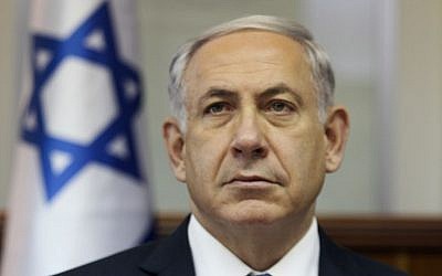 Prime Minister Benjamin Netanyahu attends a cabinet meeting in Jerusalem on October 7, 2014. (photo credit: AFP PHOTO / POOL /DAN BALILTY)