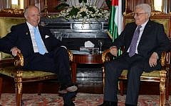 Palestinian Authority President Mahmud Abbas (R) meeting with French Foreign Minister Laurent Fabius during the Gaza Donor Conference in Cairo on October 12, 2014. photo credit: (AFP/PPO / THAER GHANEM)