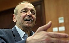 Yasser Abed Rabbo speaks to journalists in the West Bank city of Ramallah on October 16, 2014. (AFP/Abbas Momani)