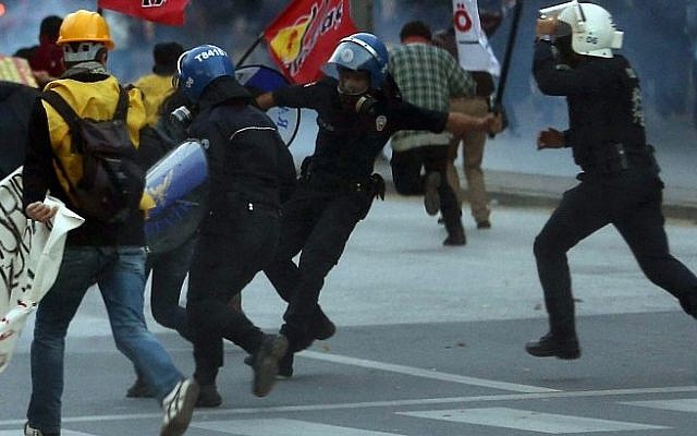 Turkish police in Ankara dispersing demonstrators protesting against the attacks launched by Islamic State insurgents on the Syrian town of Ain al-Arab, known as Kobani by the Kurds, October 8, 2014 (Photo credit: AFP/ADEM ALTAN) Turkish police in Ankara dispersing demonstrators protesting against the attacks launched by Islamic State insurgents on the Syrian town of Ain al-Arab, known as Kobani by the Kurds, October 8, 2014 (Photo credit: AFP/ADEM ALTAN)