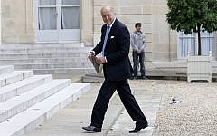French Foreign Minister Laurent Fabius, arrives at the Elysee palace to attend a meeting on October 13, 2014, in Paris. (photo credit: AFP/THOMAS SAMSON)