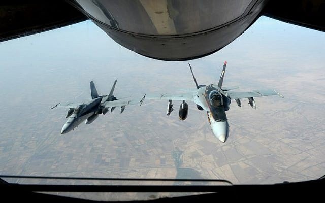 Illustrative photo of two US Super Hornets supporting operations against IS, October 4, 2014. (AFP/US Air Force handout/Staff Sgt. Shawn Nickel) Illustrative photo of two US Super Hornets supporting operations against IS, October 4, 2014. (AFP/US Air Force handout/Staff Sgt. Shawn Nickel)