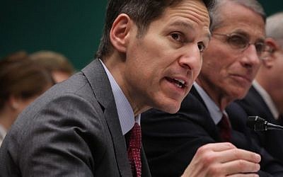 Director of the Centers for Disease Control and Prevention Dr. Thomas Frieden (left), testifies during a hearing on Ebola, on Capitol Hill in Washington, DC, October 16, 2014. (photo credit: Alex Wong/Getty Images/AFP)