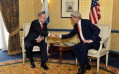 Benjamin Netanyahu, left, shaking hands with John Kerry in Washington in March 2014. (photo credit: US State Department)