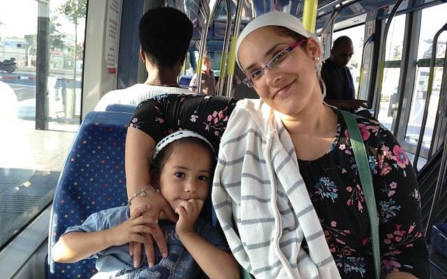 Pisgat Zeev resident Hagit Balas on the light rail, September 30, 2014 (photo credit: Elhanan Miller/Times of Israel) 
