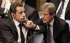 Nicolas Sarkozy, left, then-president of France, talks with his Foreign Minister Bernard Kouchner in the United Nations Security Council, Thursday, Sept. 24, 2009. (photo credit: AP Photo/Richard Drew)