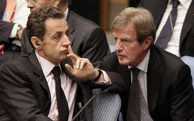 Nicolas Sarkozy, left, then-president of France, talks with his Foreign Minister Bernard Kouchner in the United Nations Security Council, Thursday, Sept. 24, 2009. (photo credit: AP Photo/Richard Drew) Nicolas Sarkozy, left, then-president of France, talks with his Foreign Minister Bernard Kouchner in the United Nations Security Council, Thursday, Sept. 24, 2009. (photo credit: AP Photo/Richard Drew)