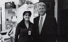 This Official White House photo taken Nov. 17, 1995, from page 3179 of Independent Counsel Kenneth Starr's report on President Clinton, showing President Clinton and Monica Lewinsky at the White House. (Photo credit: AP /OIC)