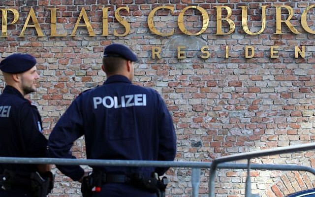 Police guard in front of Hotel Palais Coburg during closed-door nuclear talks in Vienna, Austria, Thursday, Oct. 16, 2014. EU foreign policy chief Catherine Ashton and Iranian Foreign Minister Mohammad Javad Zarif continue their nuclear talks in an effort to meet the target date of Nov. 24, but with less than six weeks left, there may be no alternative than to prolonging them. (photo credit: AP/Ronald Zak) Police guard in front of Hotel Palais Coburg during closed-door nuclear talks in Vienna, Austria, Thursday, Oct. 16, 2014. EU foreign policy chief Catherine Ashton and Iranian Foreign Minister Mohammad Javad Zarif continue their nuclear talks in an effort to meet the target date of Nov. 24, but with less than six weeks left, there may be no alternative than to prolonging them. (photo credit: AP/Ronald Zak)