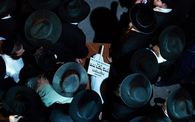 Ultra-Orthodox Jewish mourners carry the body of three-month-old Chaya Zissel Braun during her funeral in Jerusalem on October 23, 2014, after she was killed when a Palestinian driver rammed a group of pedestrians. (photo credit: AFP/ Menahem Kahana) Ultra-Orthodox Jewish mourners carry the body of three-month-old Chaya Zissel Braun during her funeral in Jerusalem on October 23, 2014, after she was killed when a Palestinian driver rammed a group of pedestrians. (photo credit: AFP/ Menahem Kahana)