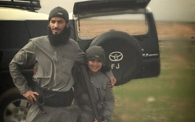 A reported Islamic State fighter and his son, the group's "youngest martyr," both said killed in a US airstrike. (photo credit: @ISTimes1, Twitter) A reported Islamic State fighter and his son, the group's "youngest martyr," both said killed in a US airstrike. (photo credit: @ISTimes1, Twitter)