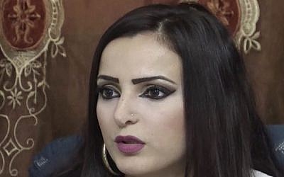 Sabren Mousa, sister of Manal Mousa, at her family home in the Galilee village of Deir Al-Assad, northern Israel. Her sister Manal Mousa's goal is to win Arab Idol, the Arab world's premiere television song competition. The journey Manal Mousa and another singer Haitham Khalaily, 24, have taken from their villages in Israel to the competition in Lebanon could comprise a television drama of its own - featuring travel to an enemy country, Israeli security interrogations, and the complicated identity crisis of Israel's Arabs. (photo credit: AP Photo/AP video) 