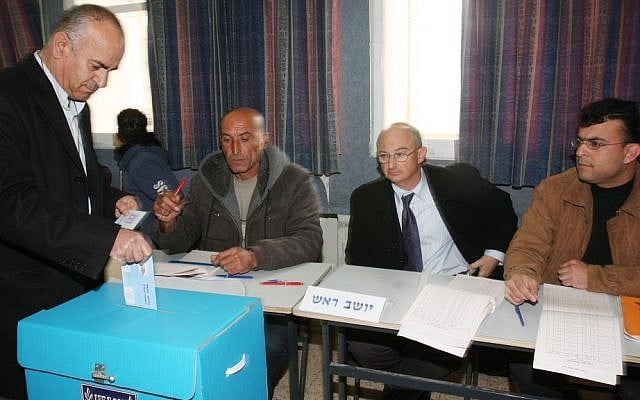 An Israeli Arab casts his vote in the Knesset elections in the northern town of Umm al-Fahm, February 10, 2009. (Photo credit: Herzl Shapira / FLASH90) An Israeli Arab casts his vote in the Knesset elections in the northern town of Umm al-Fahm, February 10, 2009. (Photo credit: Herzl Shapira / FLASH90)