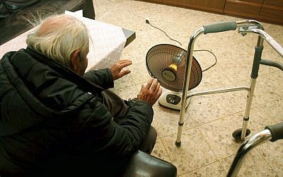 A Holocaust survivor in economic crisis in 2009. Illustrative photo. (photo credit: Edi Israel/Flash90)
