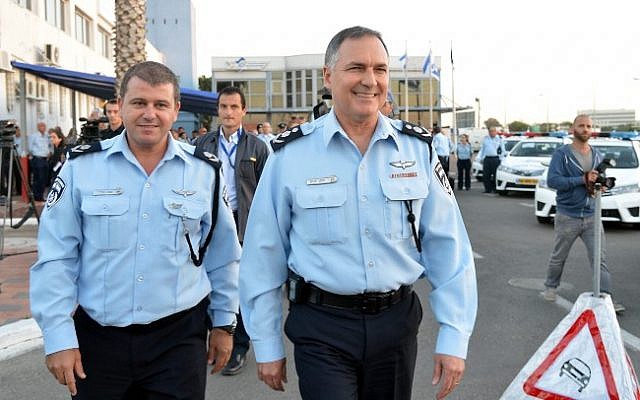 Israeli Police Commissioner Yohanan Danino (right) with commander of the Israel Traffic Police Moshe Edri (left), October 27, 2013. (photo credit: Yossi Zeliger/Flash90) Israeli Police Commissioner Yohanan Danino (right) with commander of the Israel Traffic Police Moshe Edri (left), October 27, 2013. (photo credit: Yossi Zeliger/Flash90)