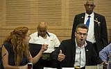 Labor MK Stav Shaffir (L) argues with Yesh Atid parliament member Boaz Toporovsky during a Finance Committee meeting regarding the zero VAT law, at the Knesset on September 3, 2014. (photo credit: Noam Revkin Fenton/Flash90)