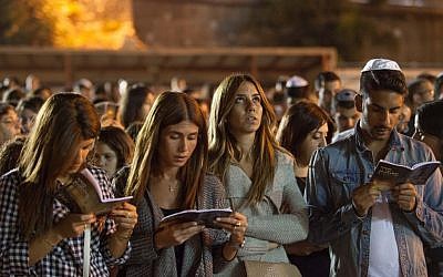 Jewish men and women praying together for forgiveness (Selichot), at the Western Wall in the Old City of Jerusalem, September 24, 2014. (Photo credit: Noam Revkin Fenton/FLASH90)