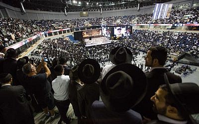 Thousands gather in memory of the spiritual leader of Israel's ultra-Orthodox Shas party Rabbi Ovadia Yosef at the arena in Jerusalem, on September 28 ,2014 (photo: Noam Revkin Fenton/Flash90 )