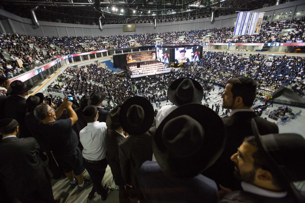 Thousands gather in memory of the spiritual leader of Israel's ultra-Orthodox Shas party Rabbi Ovadia Yosef at the arena in Jerusalem, on September 28 ,2014 (photo: Noam Revkin Fenton/Flash90 ) Thousands gather in memory of the spiritual leader of Israel's ultra-Orthodox Shas party Rabbi Ovadia Yosef at the arena in Jerusalem, on September 28 ,2014 (photo: Noam Revkin Fenton/Flash90 )