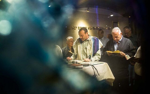 President Reuven Rivlin (right), praying for forgivness (Selichot), at the presidential residence synagogue in Jerusalem on September 30, 2014. (Photo credit: Noam Revkin Fenton/FLASH90) President Reuven Rivlin (right), praying for forgivness (Selichot), at the presidential residence synagogue in Jerusalem on September 30, 2014. (Photo credit: Noam Revkin Fenton/FLASH90)