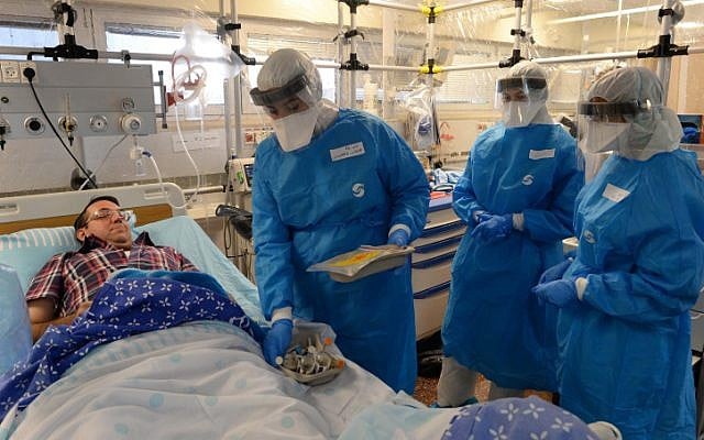 Israeli officials take part in a Ebola identification training exercise at Sheba Medical Center in Ramat Gan on October 17, 2014. (photo credit: Kobi Gideon/GPO) Israeli officials take part in a Ebola identification training exercise at Sheba Medical Center in Ramat Gan on October 17, 2014. (photo credit: Kobi Gideon/GPO)