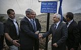 Prime Minister Benjamin Netanyahu (left); President Reuven Rivlin; Agriculture Minister, and son of Yitzhak Shamir, Yair Shamir; and Jerusalem Mayor Nir Barkat (right) inaugurate the Yitzhak Shamir Road, Route 9, on October 19, 2014. (photo credit: Hadas Parush/Flash90)