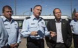 Outgoing Chief of Police Yohanan Danino (center), Jerusalem District Police Commander Moshe Edri (left) and Jerusalem Mayor Nir Barkat (photo credit: Miriam Alster/Flash90)