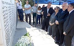President Reuven Rivlin second from right) at a memorial ceremony October 26, 2014, to mark the 58th anniversary of the Kfar Kassem massacre, during which Israeli border police shot to death 49 Arab Israelis. (Photo credit: Mark Neyman/GPO)