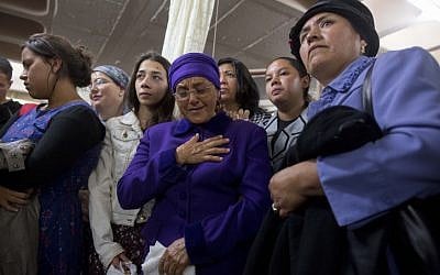 The mother of Ecuadorean Karen Yemima Muscara reacts during her daughter's funeral in Jerusalem, early Monday, October 27, 2014. (photo credit: Yonatan Sindel/Flash90)