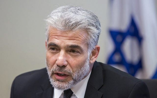 Finance Minister Yair Lapid at the Knesset, October 27, 2014. (photo credit: Yonatan Sindel/Flash90) Finance Minister Yair Lapid at the Knesset, October 27, 2014. (photo credit: Yonatan Sindel/Flash90)