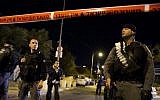 Israeli Police block the area where the Temple Mount Movement Leader, Yehudah Glick, was shot by a drive-by motorist, near the Pa'amon Park in Jerusalem, October 29, 2014. (Photo credit: Yonatan Sindel/Flash90)