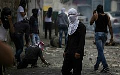 Palestinian youth clash with Israeli police in the Abu Tor neighborhood, October 30, 2014. (photo credit: Hadas Parush/Flash90)