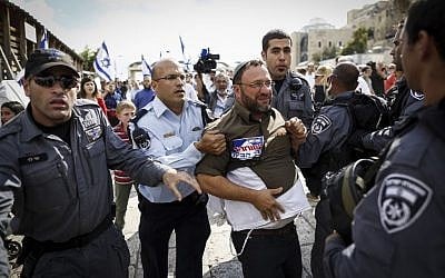 Israeli police arrest right-wing activists who tried to enter the Temple Mount in Jerusalem's Old City on October 30, 2014. (Photo credit: Yonatan Sindel/Flash90)