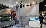 A model of Israeli firm Rafael's C-Dome is presented at the Euronaval show, in Le Bourget, north of Paris, October 30, 2014. (AP Photo/Christophe Ena)