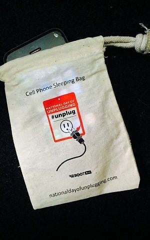 On the National Day of Unplugging, put your phone in a sleeping bag and spend a Shabbat technology-free. (courtesy)