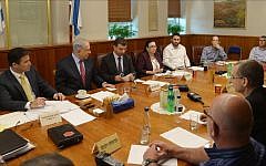 Prime Minister Benjamin Netanyahu convenes a meeting on the Ebola outbreak on October 12, 2014 (photo credit: GPO/Amos Ben Gershom)