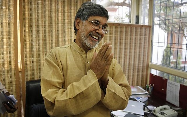 Indian children's rights activist Kailash Satyarthi gestures as he addresses the media at his office in New Delhi, India, Friday, Oct. 10, 2014. Malala Yousafzai of Pakistan and Satyarthi of India jointly won the Nobel Peace Prize on Friday, Oct. 10, 2014, for risking their lives to fight for children's rights. (photo credit: AP Photo/Manish Swarup) Indian children's rights activist Kailash Satyarthi gestures as he addresses the media at his office in New Delhi, India, Friday, Oct. 10, 2014. Malala Yousafzai of Pakistan and Satyarthi of India jointly won the Nobel Peace Prize on Friday, Oct. 10, 2014, for risking their lives to fight for children's rights. (photo credit: AP Photo/Manish Swarup)