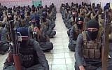 Still from a video of Islamic State fighters at a training camp in Iraq. The video was posted online on October 11, 2014. (screen capture: YouTube)