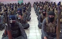 Still from a video of Islamic State fighters at a training camp in Iraq. The video was posted online on October 11, 2014. (screen capture: YouTube)