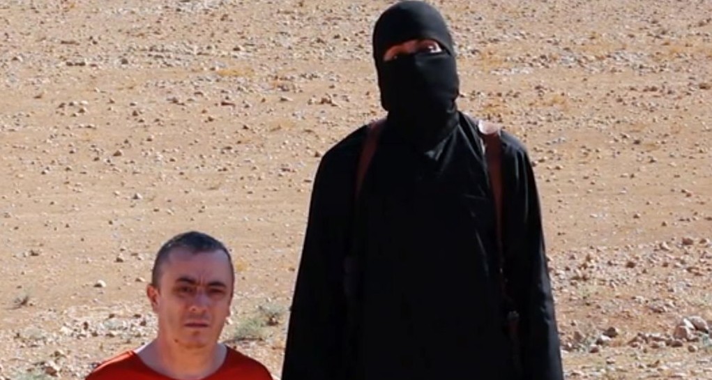 A frame from a video released Friday, Oct. 3, 2014, by Islamic State terrorists that shows the killing of British aid worker Alan Henning (photo credit: AP Photo) A frame from a video released Friday, Oct. 3, 2014, by Islamic State terrorists that shows the killing of British aid worker Alan Henning (photo credit: AP Photo)
