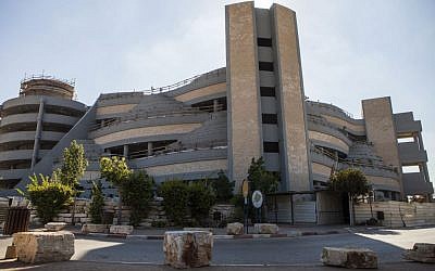 This Monday, Oct. 6, 2014 photo shows a new part vertical part of the Yarkon cemetery outside of the city of Petah Tikva, Israel. Cemetery overcrowding is an issue that resonates the world over, particularly in its most cramped cities and among religions that forbid or discourage cremation. The reality of relying on finite land resources to cope with the endless stream of the dying has brought about creative solutions. (Photo credit: AP/Dan Balilty) An illustrative photo of a vertical part of the Yarkon cemetery outside Petah Tikva. (Photo credit: AP/Dan Balilty)