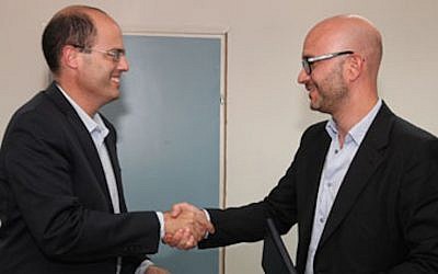 Chief Scientist of the Ministry of Economy of Israel, Avi Hasson, (L) and CEO Telefonica I&D Carlos Domingo (Photo credit: Courtesy)