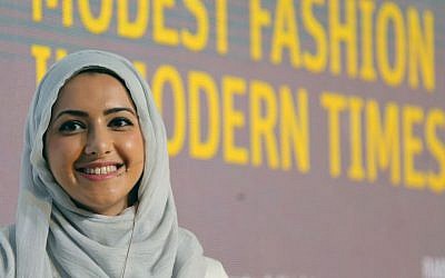 In this Oct. 5, 2014 photo, Summer Albarcha, owner of photo-sharing Instagram account "Hipster Hijabis", talks during a Fashion Forward session in Dubai, United Arab Emirates. By fusing both their sense of fashion with their faith, Muslim women are reinterpreting traditional notions of what it means to dress conservatively. Some have also pioneered businesses around this growing demand, finding unexpected supporters among some mainstream brands, as well as conservative Christian and Orthodox Jewish women. (Photo credit: AP/Kamran Jebreili)