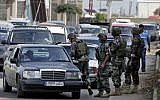 Illustrative: Lebanese army soldiers inspect a vehicle at a checkpoint on a road, in the northern port city of Tripoli, Lebanon, Monday, Oct. 27, 2014. (AP Photo/Bilal Hussein)
