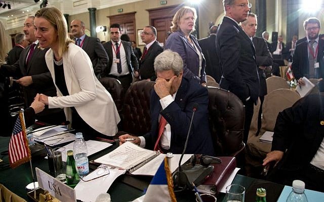 U.S Secretary of State John Kerry pauses to rub his face, in Cairo, Egypt, Sunday, Oct. 12, 2014, during the Gaza Donor Conference. (photo credit: AP Photo/Carolyn Aster, Pool) U.S Secretary of State John Kerry pauses to rub his face, in Cairo, Egypt, Sunday, Oct. 12, 2014, during the Gaza Donor Conference. (photo credit: AP Photo/Carolyn Aster, Pool)