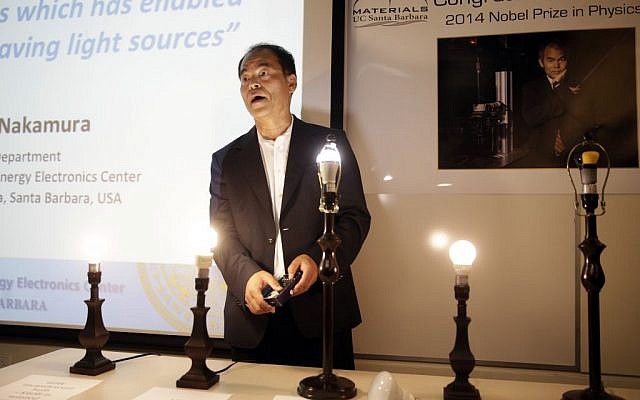 Scientist Shuji Nakamura, a Japanese-born American professor at the University of California, Santa Barbara, demonstrates LED lights during a news conference, Tuesday, Oct. 7, 2014, in Santa Barbara, Calif. Nakamura and two Japanese scientists won the Nobel Prize in physics on Tuesday for inventing blue light-emitting diodes, a breakthrough that has spurred the development of LED technology to light up homes, computer screens and smartphones worldwide. (photo credit: AP/Jae C. Hong) Scientist Shuji Nakamura, a Japanese-born American professor at the University of California, Santa Barbara, demonstrates LED lights during a news conference, Tuesday, Oct. 7, 2014, in Santa Barbara, Calif. Nakamura and two Japanese scientists won the Nobel Prize in physics on Tuesday for inventing blue light-emitting diodes, a breakthrough that has spurred the development of LED technology to light up homes, computer screens and smartphones worldwide. (photo credit: AP/Jae C. Hong)