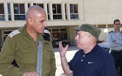 Jewish Agency Chairman Natan Sharansky and IDF GOC Southern Command Maj. Gen. Shlomo (Sami) Turgeman attend the opening session of the Jewish Agency Board of Governors meetings in Kibbutz Nahal Oz. (photo credit: David Shechter)