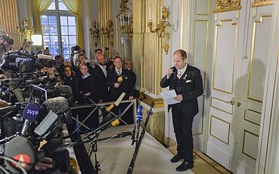 Permanent secretary of the Swedish Academy, Peter Englund, announces French writer Patrick Modiano as the winner of the 2014 Nobel Prize in Literature, Thursday Oct. 9, 2014, in Stockholm, Sweden. The prize was awarded 'for the art of memory with which he has evoked the most ungraspable human destinies and uncovered the life-world of the occupation,' the Swedish Academy said. (photo credit: AP Photo / Anders Wiklund)