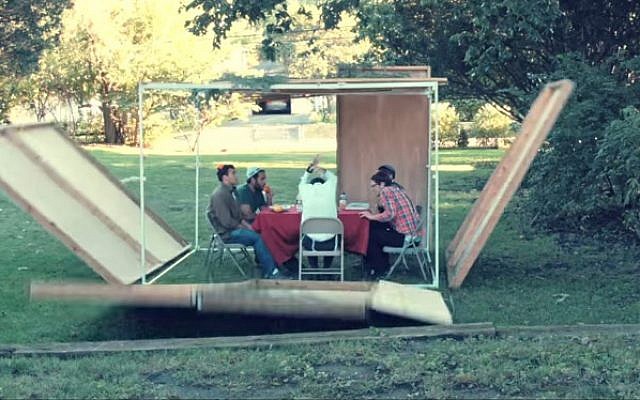 Sukkahs keep falling in Rogers Park's "Sukkah's Falling" parody video. (YouTube screenshot) Sukkahs keep falling in Rogers Park's "Sukkah's Falling" parody video. (YouTube screenshot)
